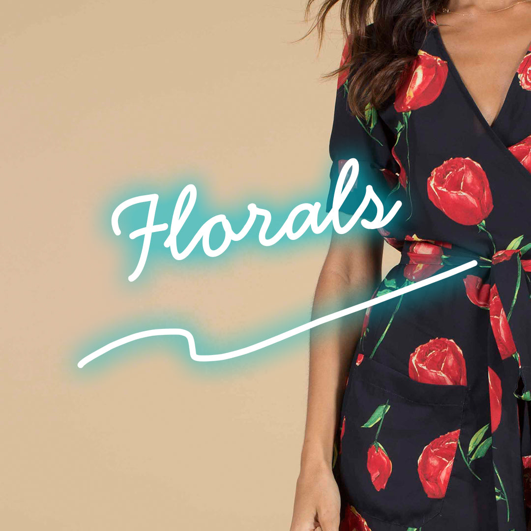 Dancing Leopard model wearing Zahara Dress in Rose with Florals text overlay