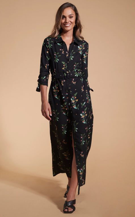 Model facing forwards wearing a floral Dancing Leopard print dress.