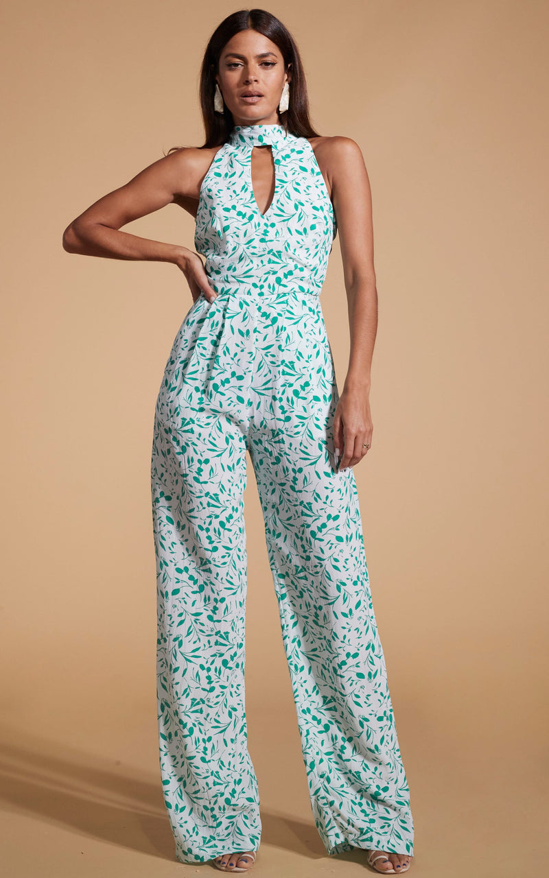 Dancing Leopard model wearing Cypress Jumpsuit In Green Leaf posed with hand on hip