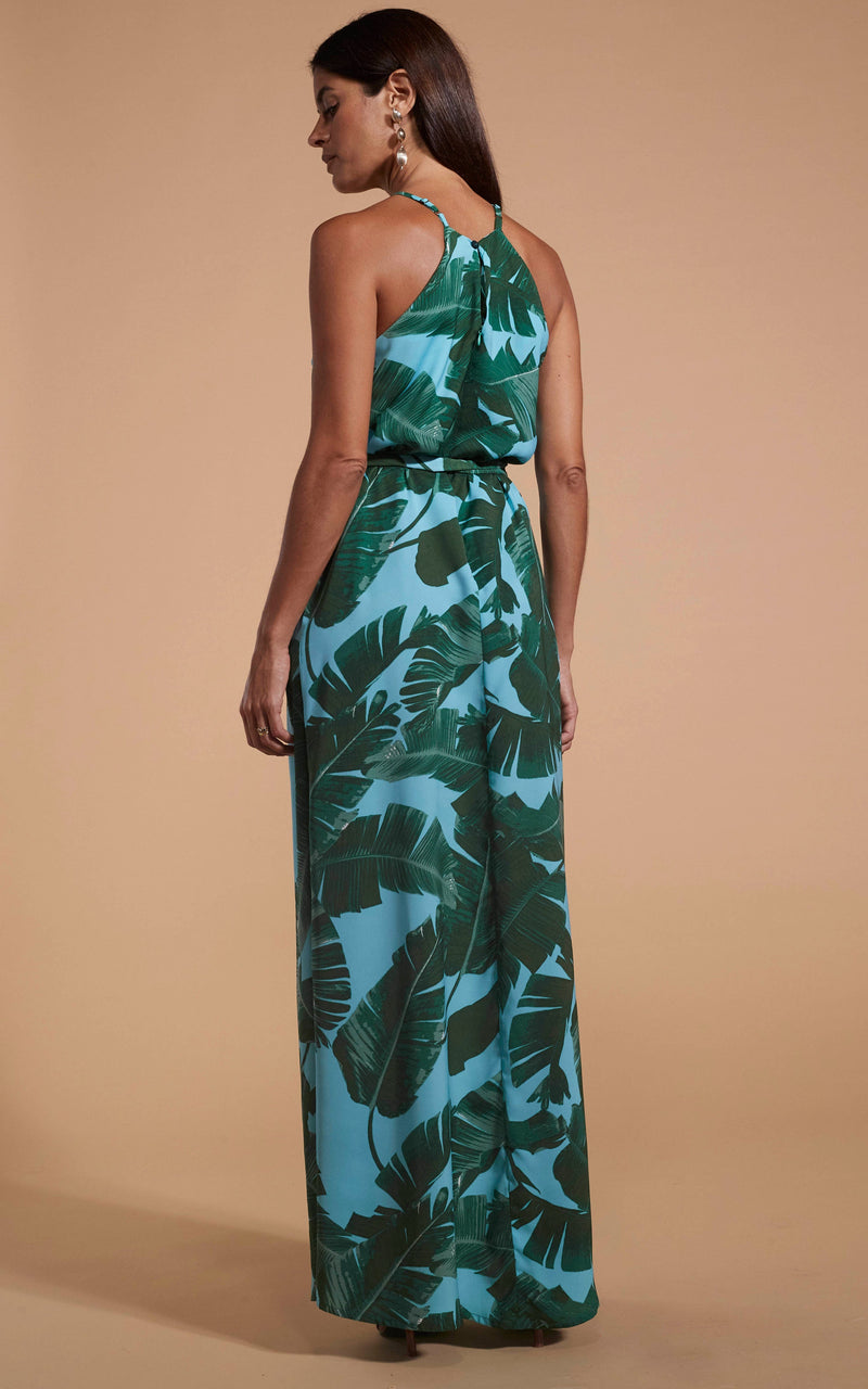 Dancing Leopard model wearing Sunset Dress In Vintage Blue Palm facing away to reveal back details