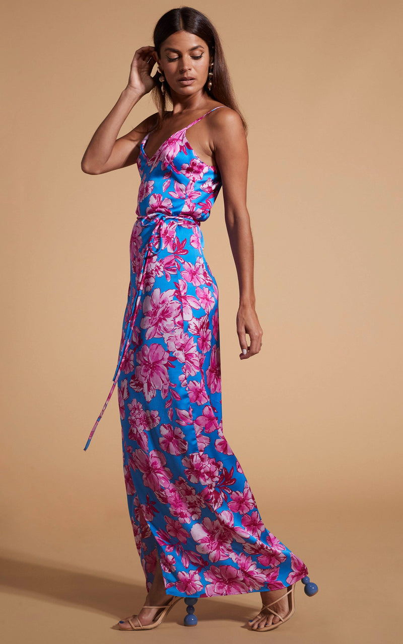 Dancing Leopard model wearing Mariah Wrap Dress In Pink & Blue Floral facing side on