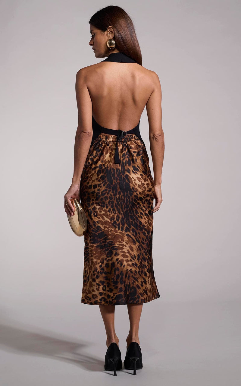 Mid length leopard skirts 70s online