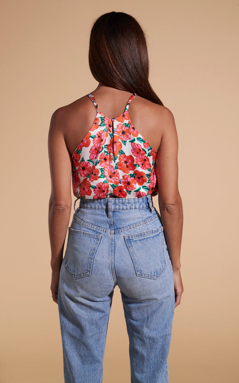 Dancing Leopard model wearing Nina Halter Cami Top In Hibiscus Red Orange On White with back turned