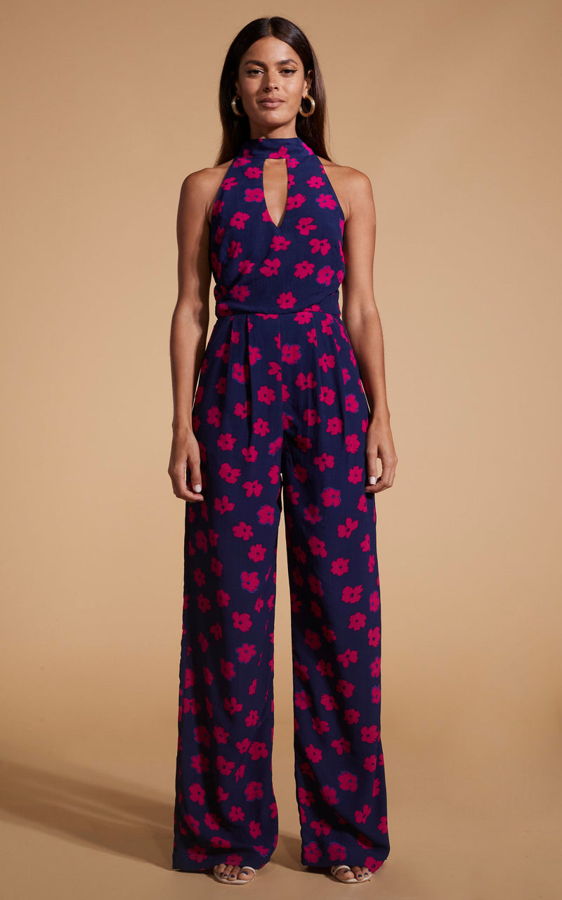 Dancing Leopard model wearing Cypress Jumpsuit In Pink Daisy