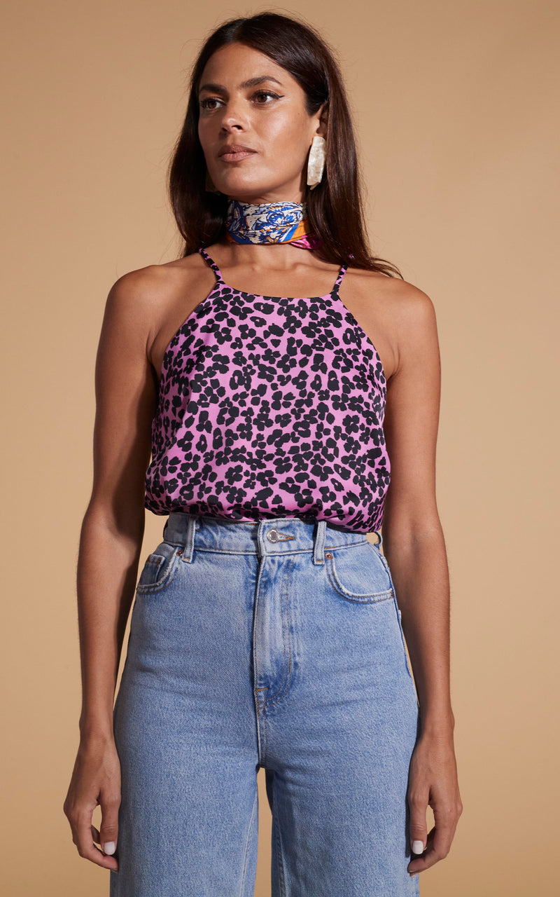 Dancing Leopard model wearing Nina Halter Cami Top In Black On Pink Leopard