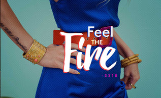 close up of body in blue dress with feel the fire text overlay
