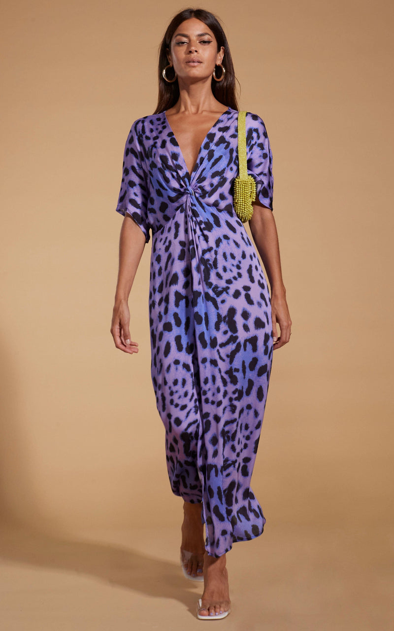 Dancing Leopard model wearing Makuna Kaftan In Lilac Leopard walking towards shot