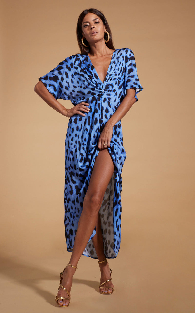 Dancing Leopard model wearing Makuna Kaftan In Bright Blue Leopard