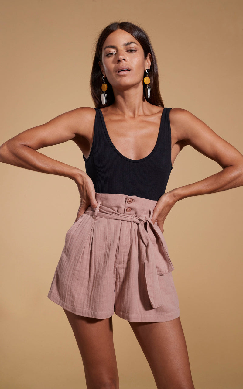 Dancing Leopard model wearing HALO Nessie High Waist Shorts in Fawn posed with hands on hips