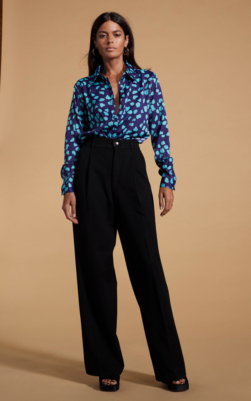 Dancing Leopard model wearing Nevada Satin Shirt In Ice Blue On Navy Cloud
