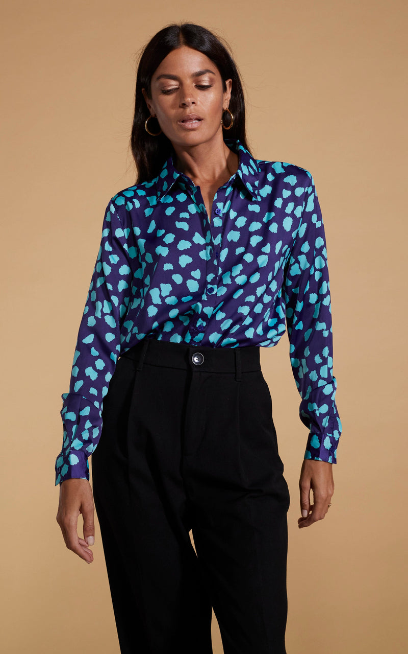 Dancing Leopard model wearing Nevada Satin Shirt In Ice Blue On Navy Cloud posed with arms by side