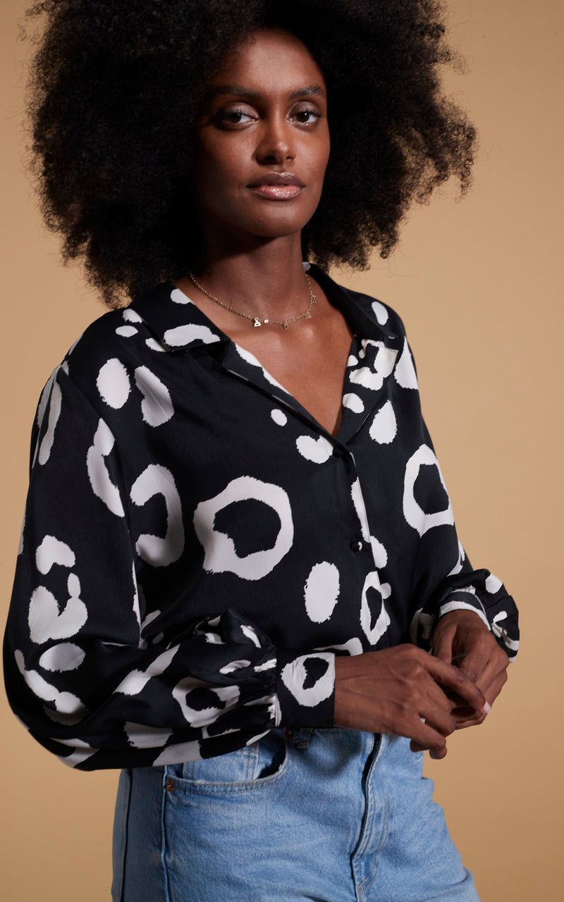 close up of Dancing Leopard model wearing Dixie Balloon Sleeve Shirt In Oversized Mono Leopard