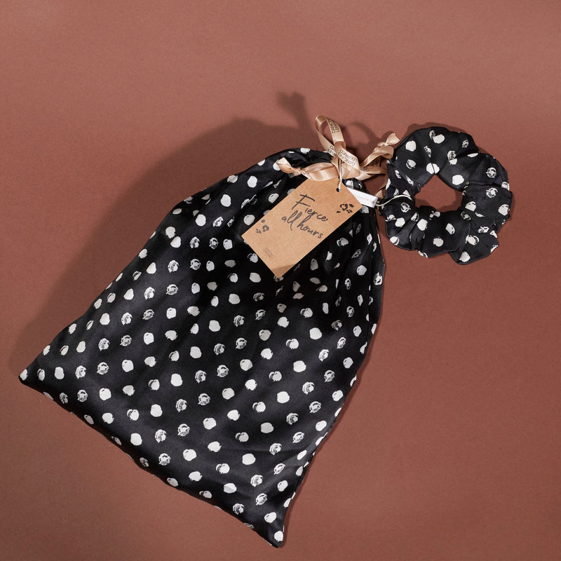 black polka dot pyjama bag