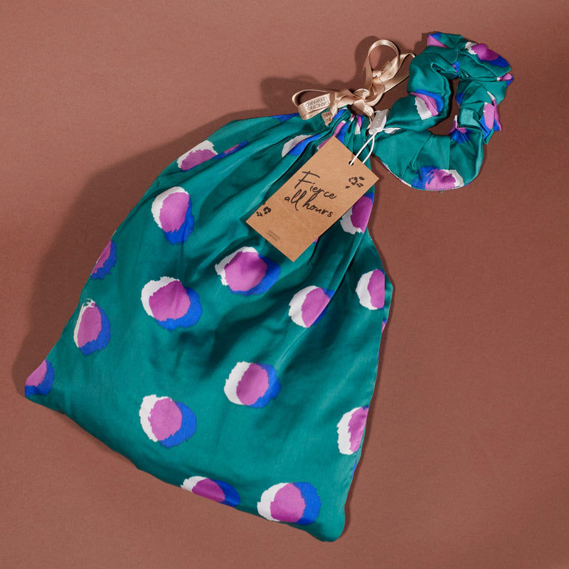 purple on green polka dot pyjama bag
