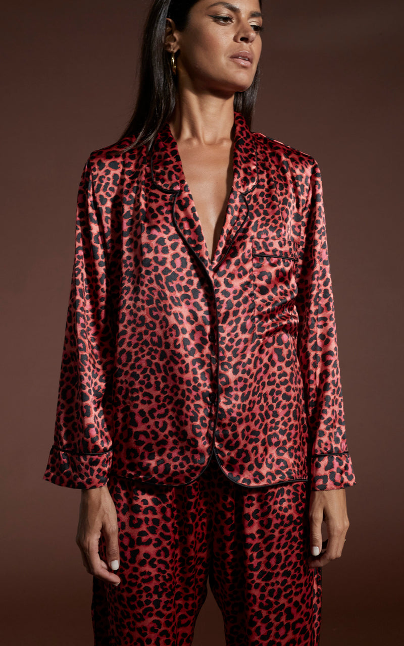 close up of Dancing Leopard model wearing Cosmos Satin Long Leg PJ Set in Ruby Red Leopard