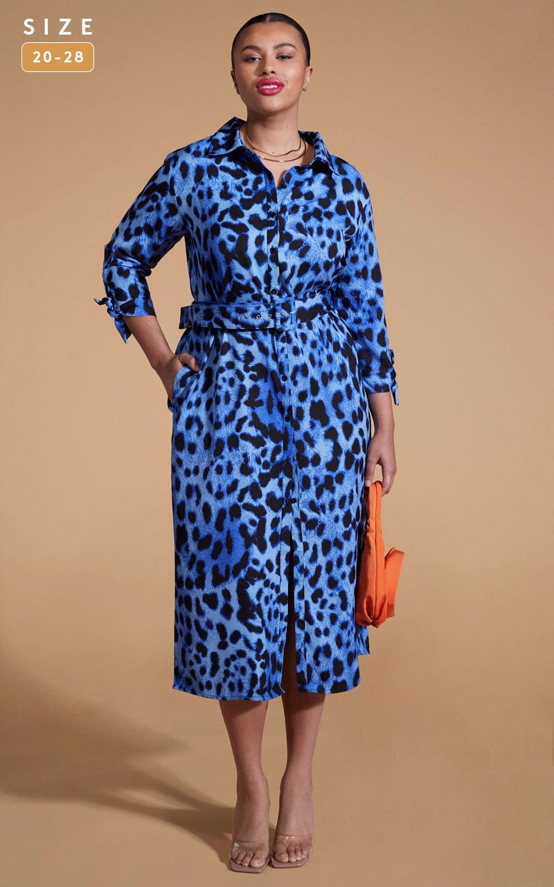 Dancing Leopard model wearing Alva Midi Shirt Dress In Bright Blue Leopard holding orange bag