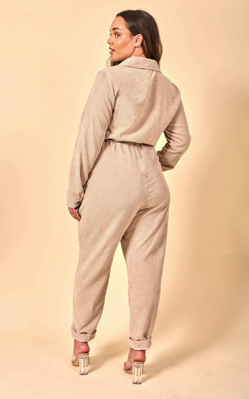 Dancing Leopard model wearing Blaze Boilersuit in Sand facing away