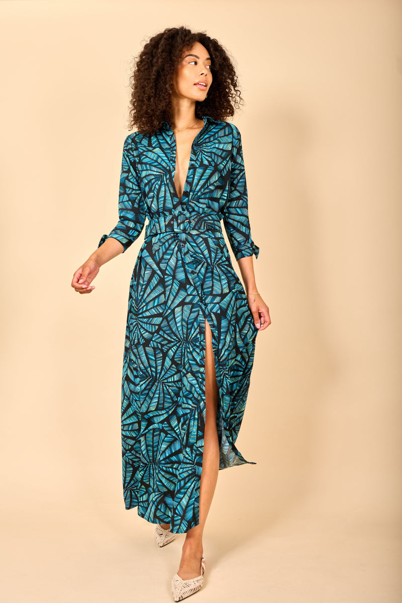 Dancing Leopard model wearing Dove Dress in Fan Turquoise on Black posed looking away