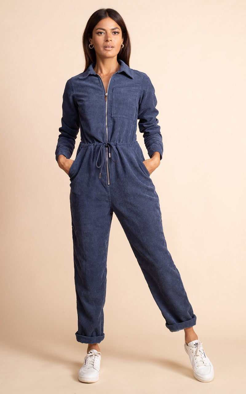 Dancing Leopard model standing forwards with leg out wearing blaze boiler suit in army blue