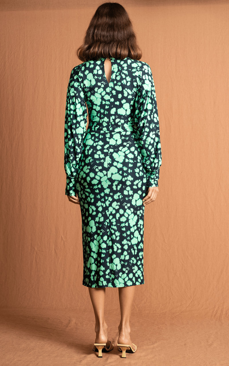 Dancing Leopard model wearing Zoe Midi Dress in Green Inky Leopard facing away to reveal back of dress