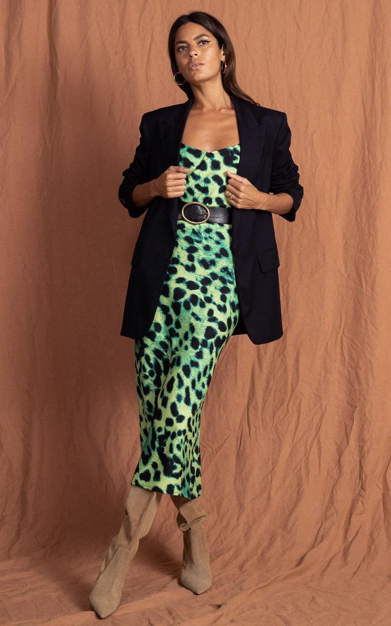 Dancing Leopard model faces forward wearing Sienna Midaxi in Lime Leopard Print with heels,belt  and black blazer