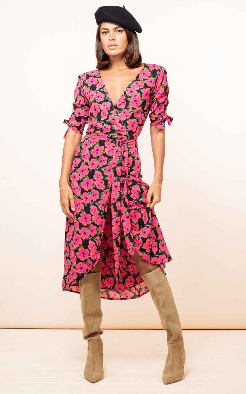 Dancing Leopard model wearing Olivera Midi Dress in Hibiscus Pink on Black with knee high boots and black beret