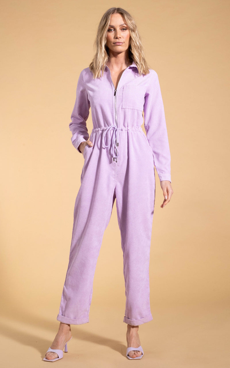 Dancing Leopard model wearing Blaze Boilersuit in Lilac posed with hand in pocket