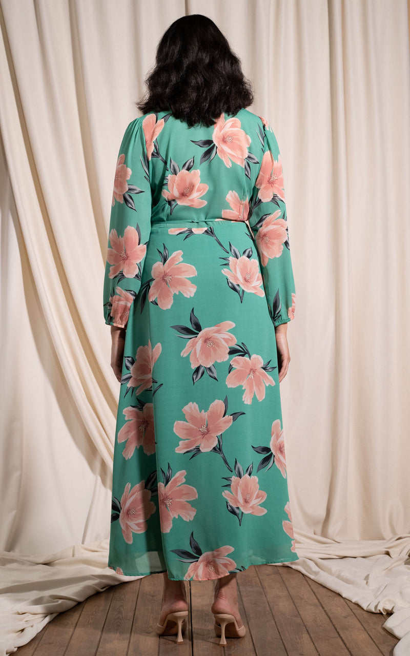 Dancing Leopard model standing with back to the camera wearing Jagger dress insane base tulip