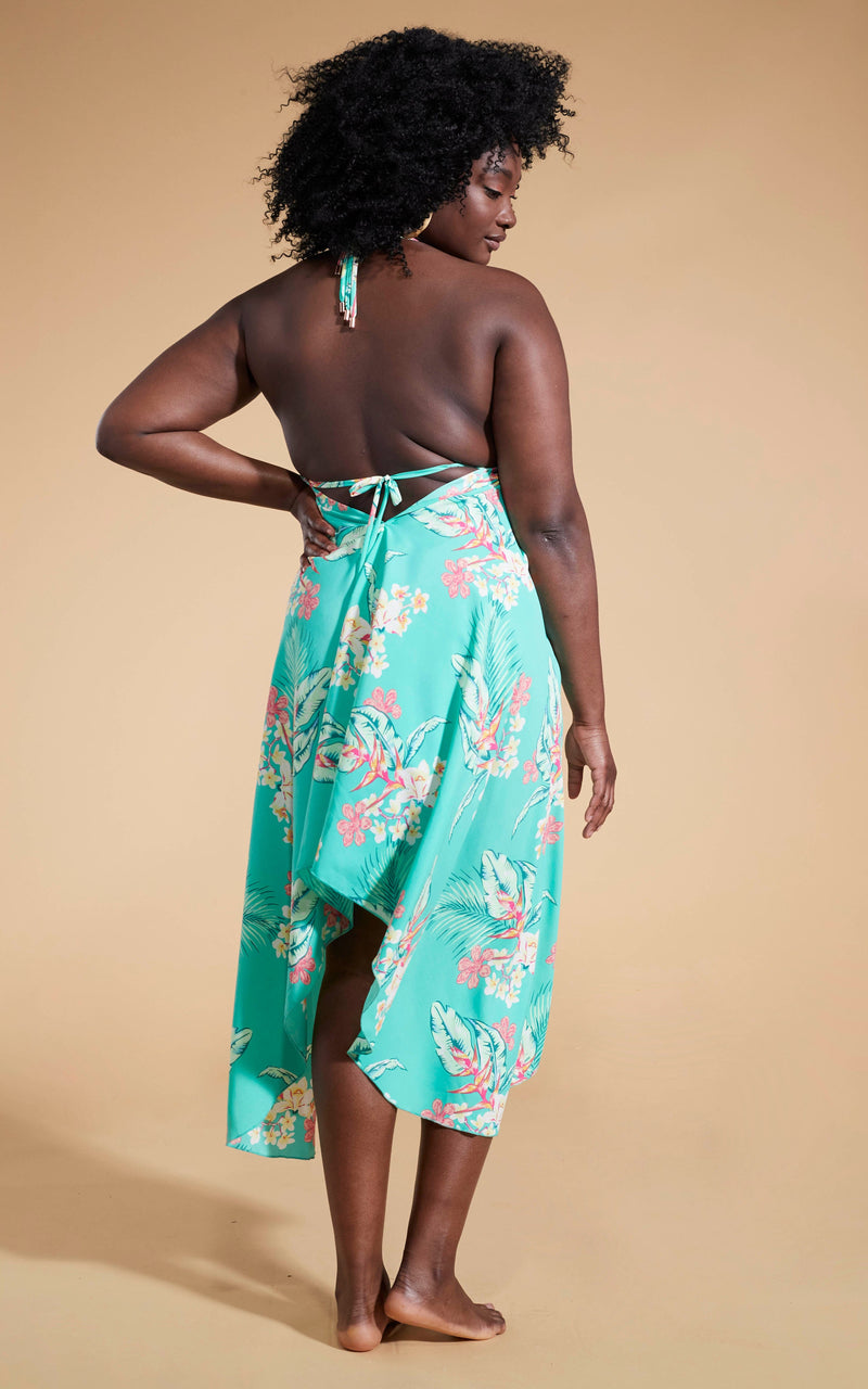 Dancing Leopard model wearing Dancing Leopard model wearing Boho Maxi Dress in Green Tropical facing away