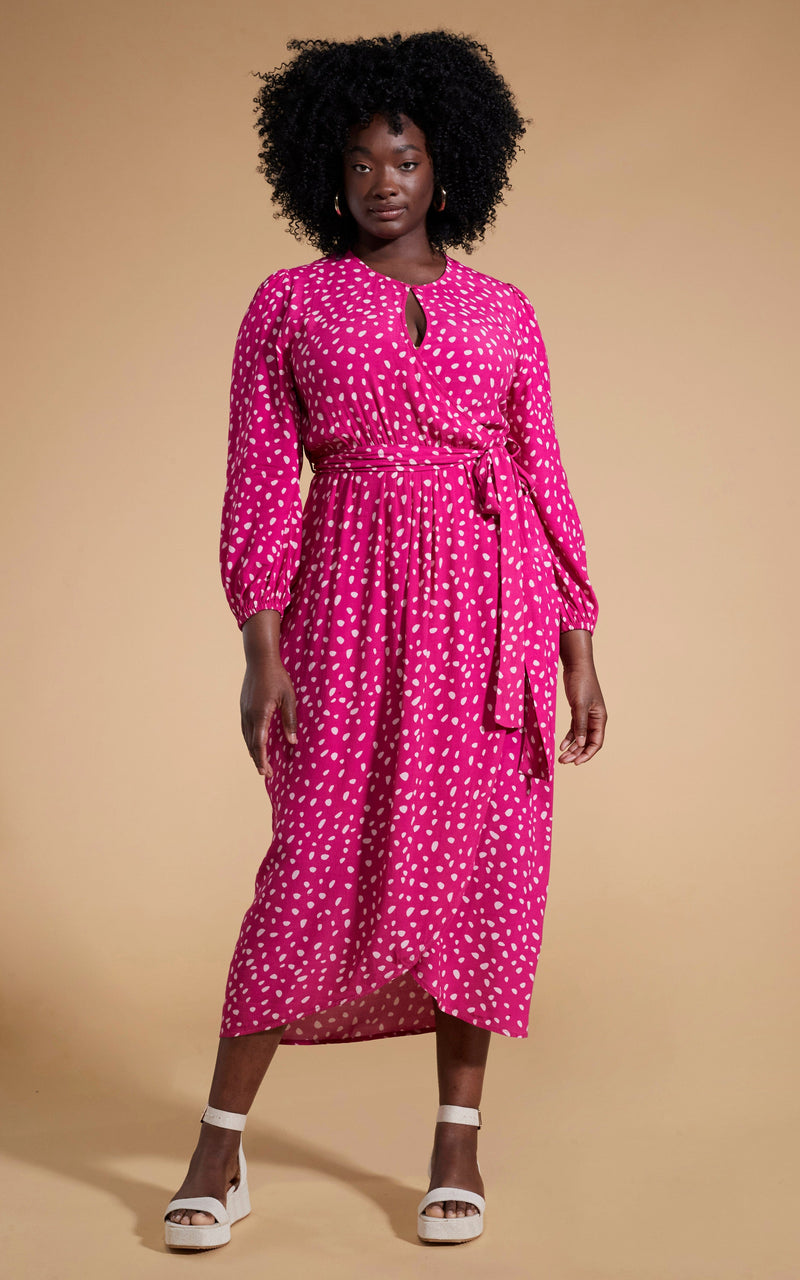 Dancing Leopard model wearing Mabel Midaxi Mock Wrap Dress in Odd Dot Pink on Magenta