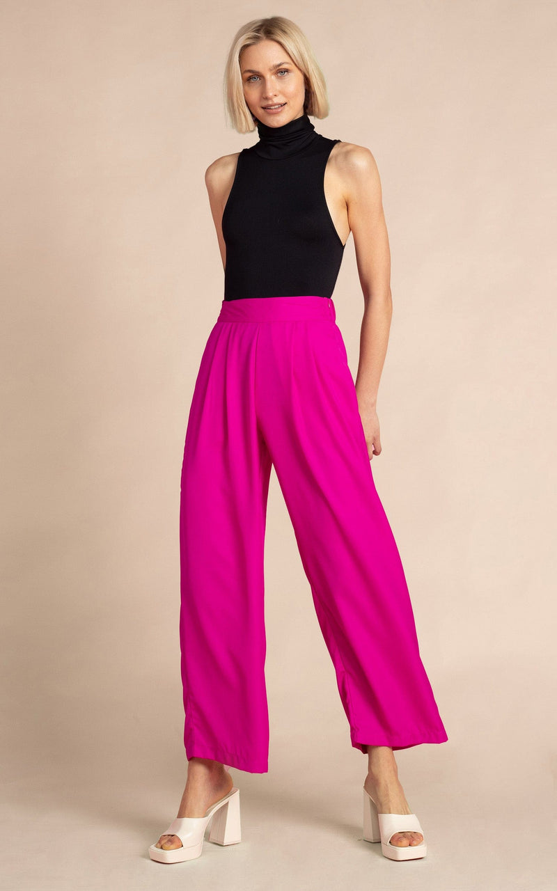 Dancing Leopard model wearing Joey Palazzo Trousers in Magenta