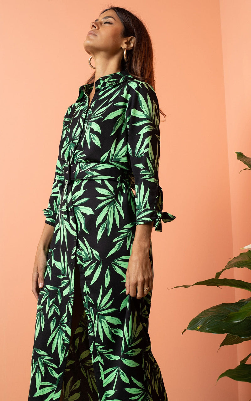 Dancing Leopard model wearing Alva Midi Shirt Dress in Tropic Green on Black posed with eyes closed looking up