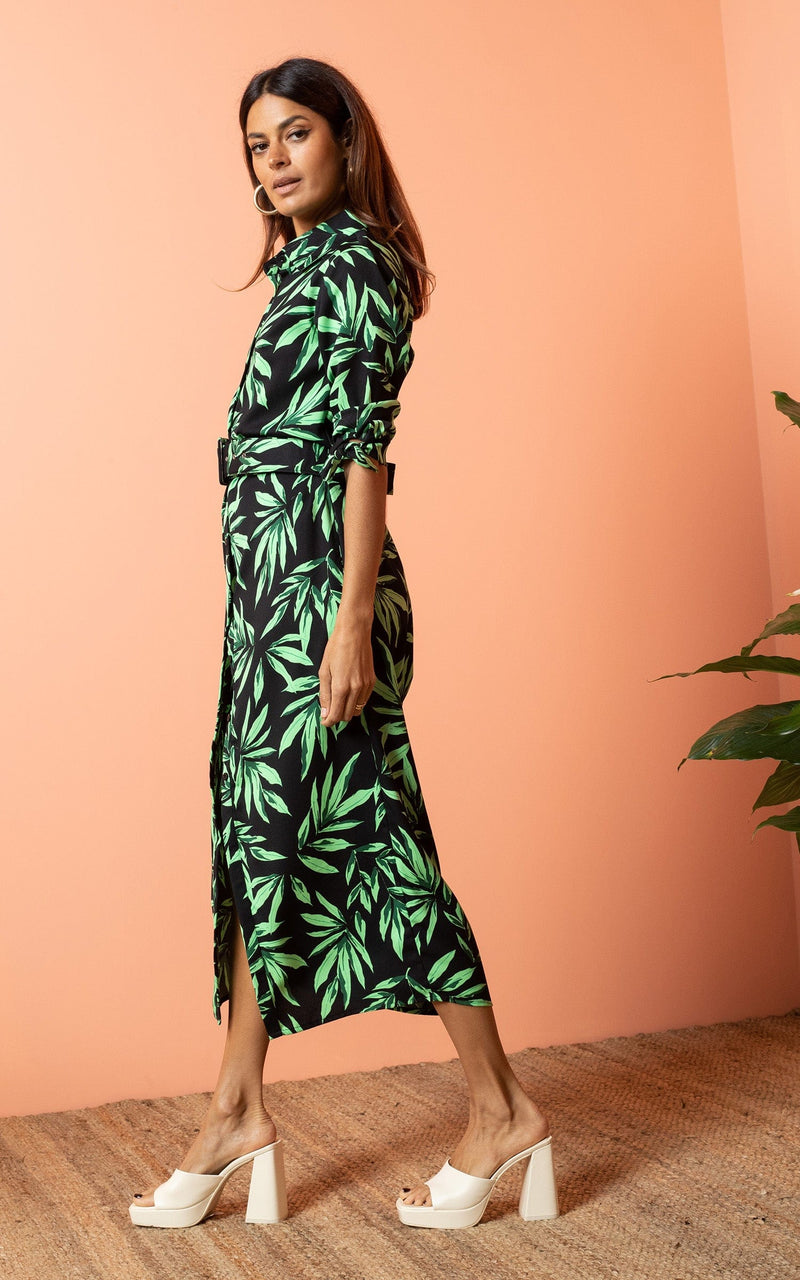 Dancing Leopard model wearing Alva Midi Shirt Dress in Tropic Green on Black walking from right to left