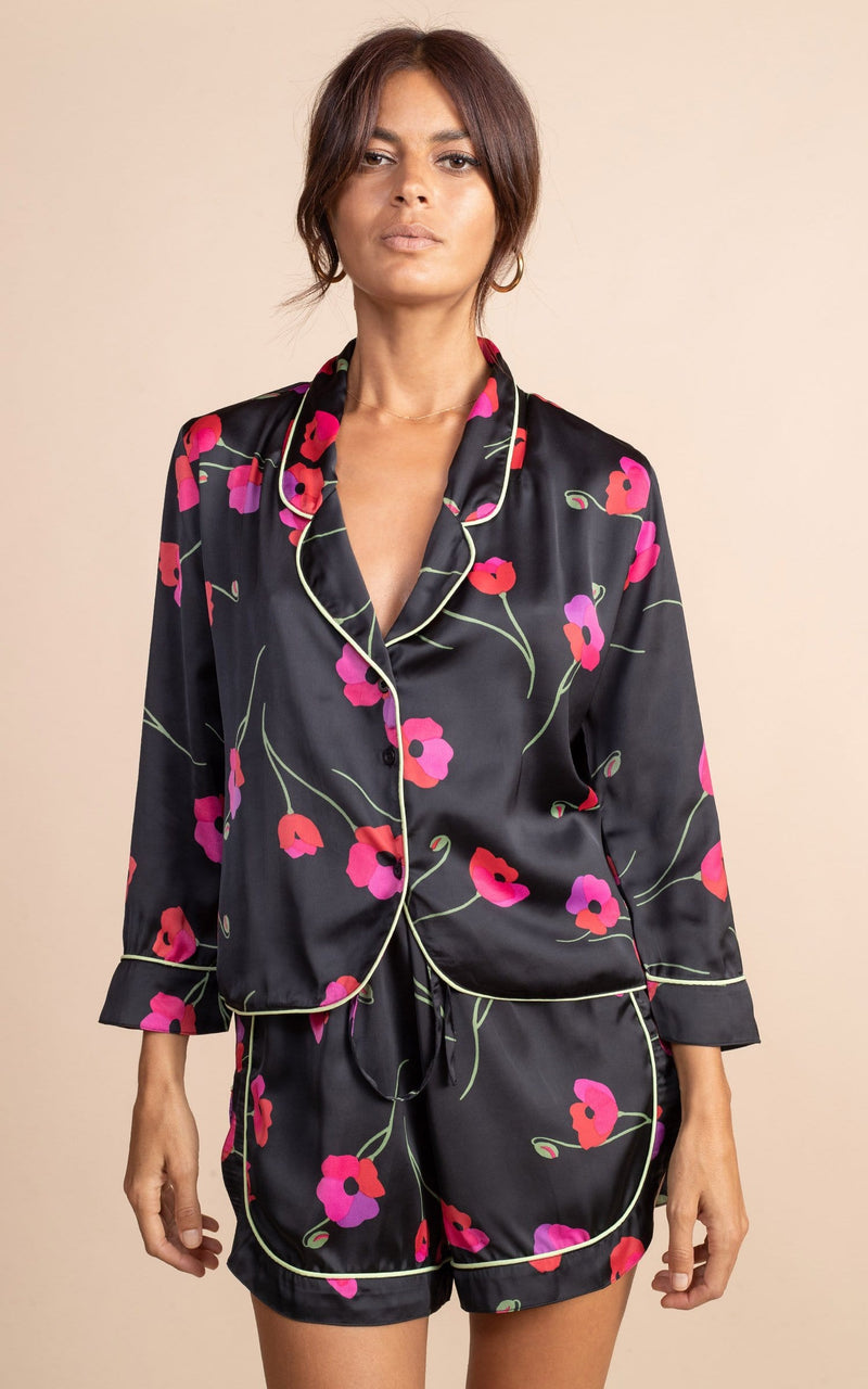 Dancing Leopard model standing in Oona Pj set with shorts in black poppies