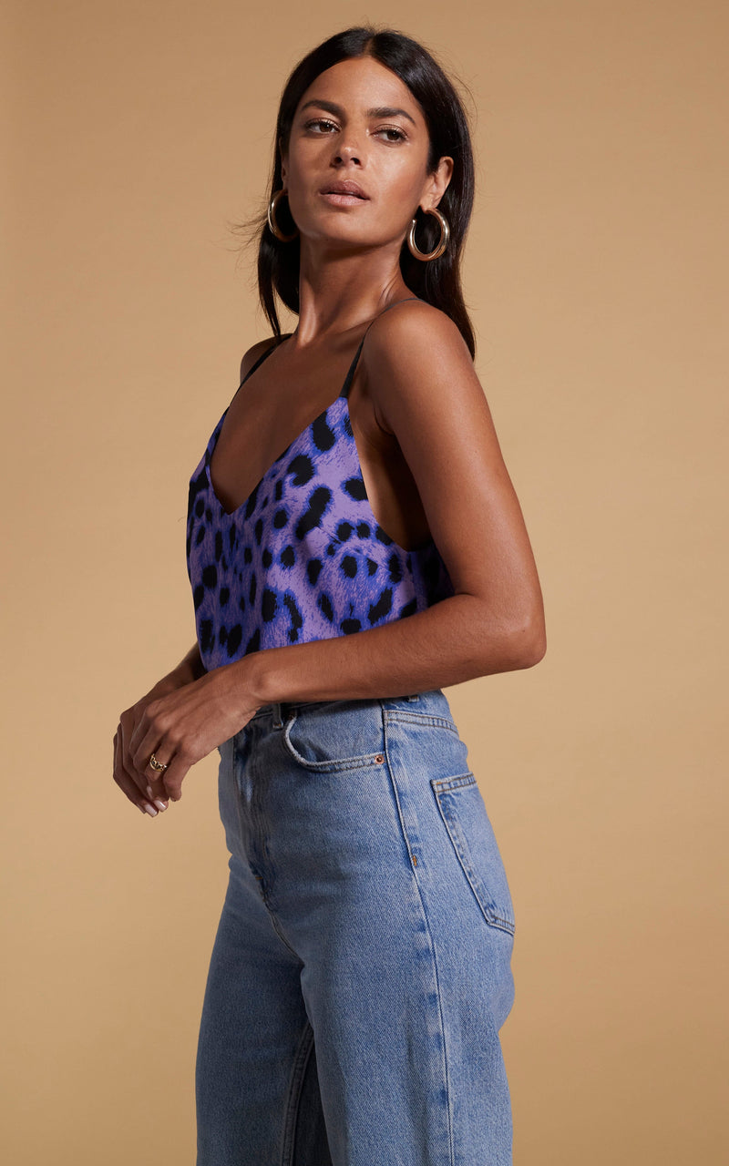 Dancing Leopard model wearing Birdie Cami Top in Lilac Leopard facing side on