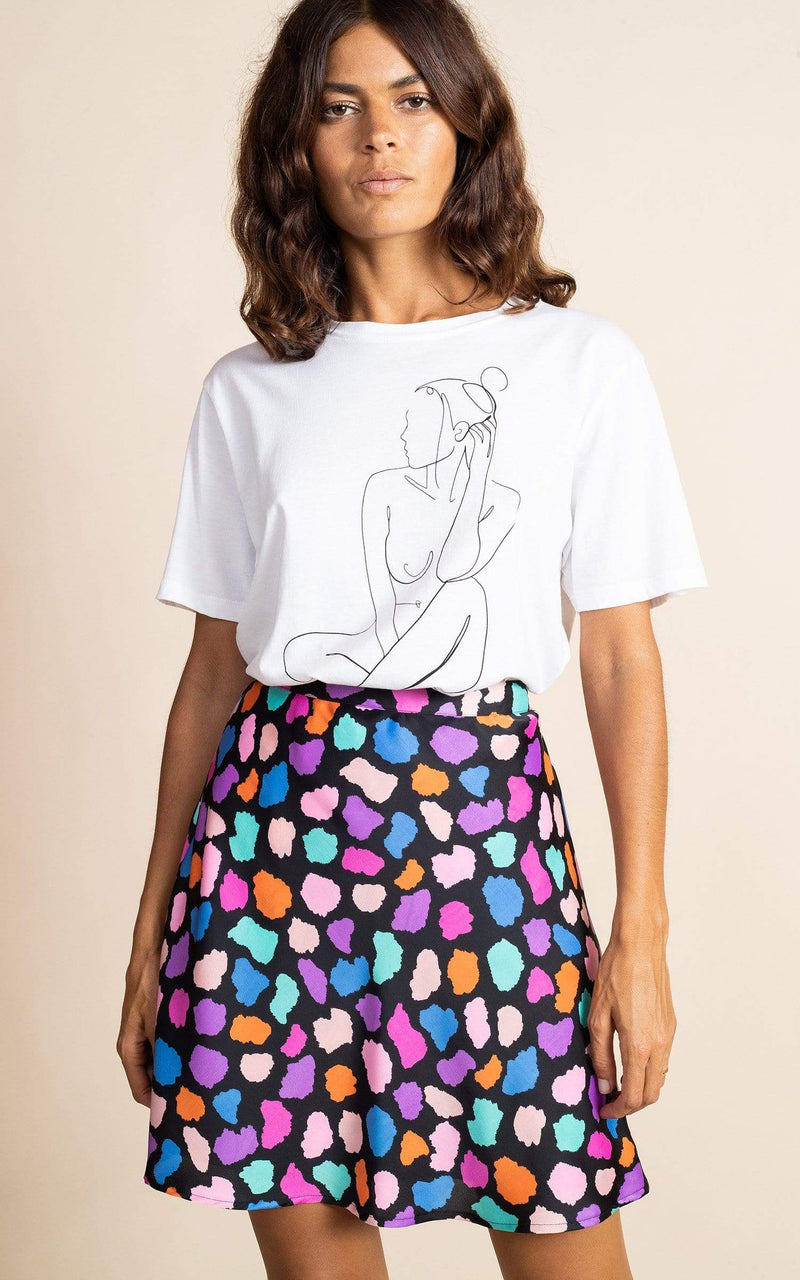 Dancing Leopard model faces forward wearing Stevie Skirt in multi cloud with t-shirt and heels