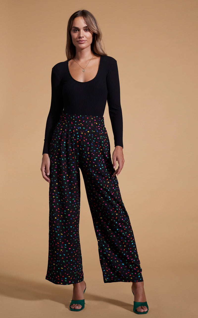 Dancing Leopard model wearing Joey Palazzo Trousers in Abstract Multi