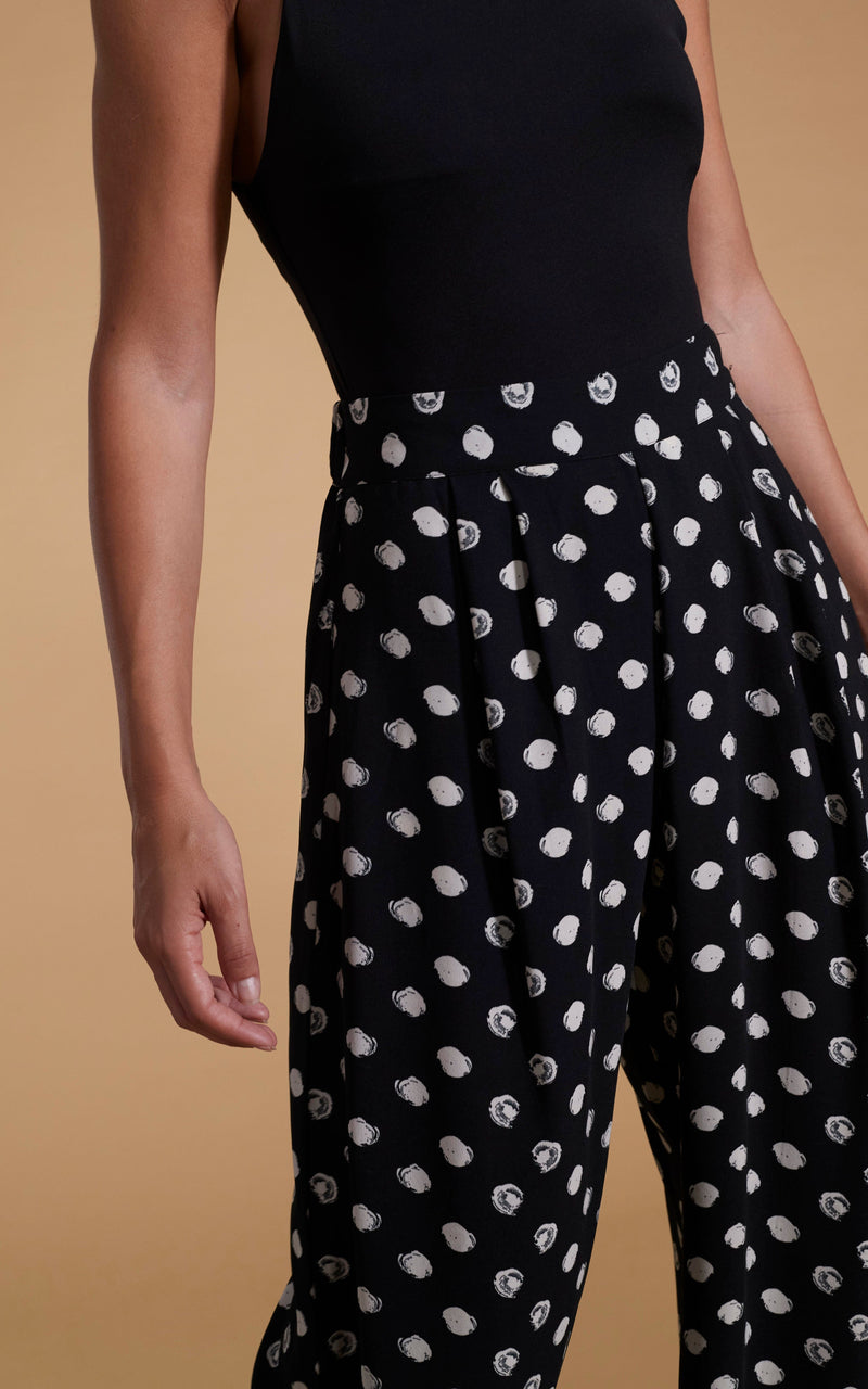 close up of Dancing Leopard model wearing Joey Palazzo Trousers in Painted Dot